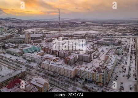 The aerial panorama view of the streets, buildings, and residential areas of the Ulan-Ude, Republic of Buryatiya, Russia, during the cold winter day. Stock Photo