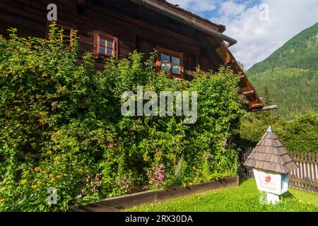 Mallnitz: historic wooden house Schusterkeusche, as a typical Einhof house in Nationalpark Hohe Tauern, Kärnten, Carinthia, Austria Stock Photo