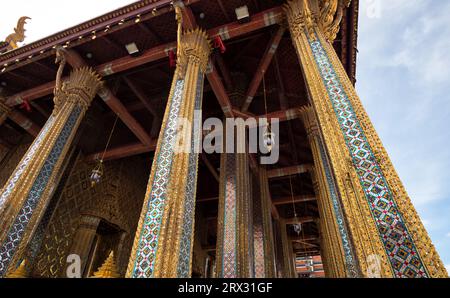 Close up to the artistic architecture and decoration of Phra Ubosot or The Chapel of The Emerald Buddha or Wat Phra Kaew, The Grand Palace, Thailand - Stock Photo
