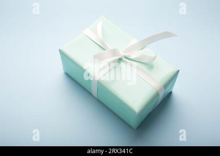 Present boxes on blue background greeting card holidays concept. High quality photo Stock Photo