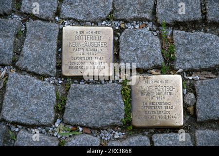 Stolpersteine plaques with names of concentration camp victims embedded in the pavement, Salzburg, Austria, Europe Stock Photo