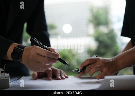Architect doing consulting teamwork in the office. Stock Photo