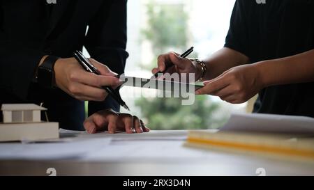 Architect doing consulting teamwork in the office. Stock Photo