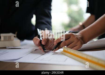 Architect doing consulting teamwork in the office. Stock Photo