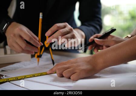 Architect doing consulting teamwork in the office. Stock Photo