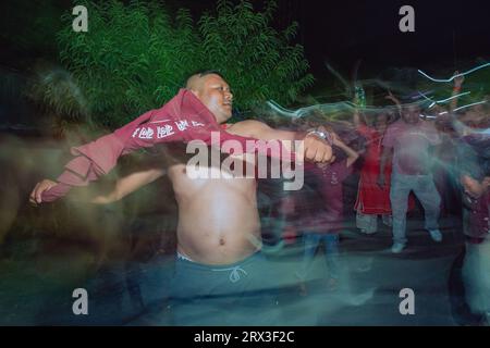 Nepal. 22nd Sep, 2023. People dance and celebrate as the members of Choking Ganesh Dhimey Baja Khala complete their music training session in Sipadol, Bhaktapur on Friday. (Credit Image: © Amit Machamasi/ZUMA Press Wire) EDITORIAL USAGE ONLY! Not for Commercial USAGE! Stock Photo