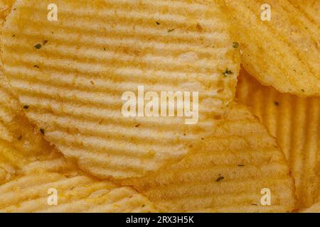 Lots of potato chips, texture close up Stock Photo