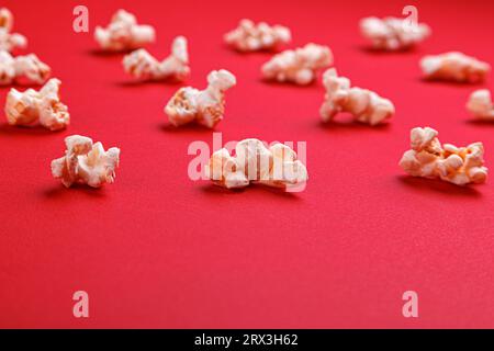 popcorn macro on a red background close-up Stock Photo