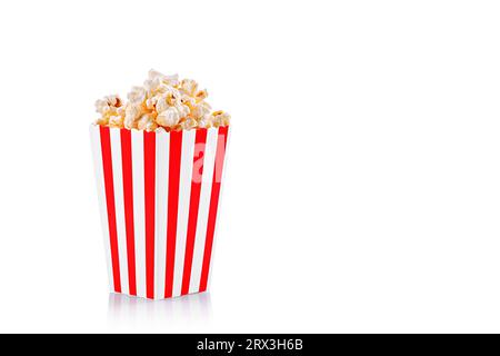 Glass with popcorn on a white background close-up Stock Photo