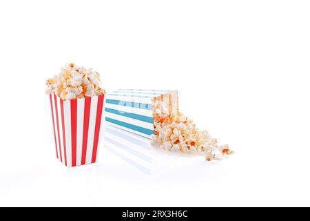 Glass with popcorn on a white background close-up Stock Photo