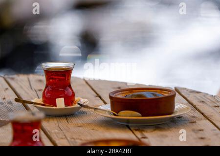 Turkish tea and rice pudding on the wood table Stock Photo