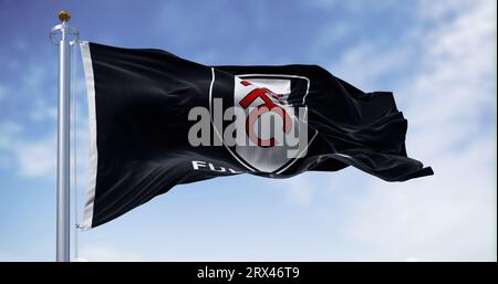 London, UK, aug 15 2023: flag of Fulham Football Club waving. Professional Football club based in London. English Premier League. Fluttering fabric. I Stock Photo