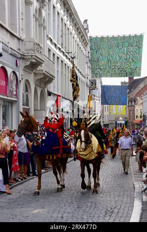 Grey horse with rider in purple dress, baroque horse festival Stock ...