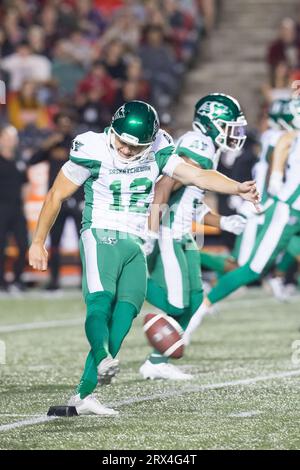 Ottawa, Canada. 22nd Sep, 2023. Saskatchewan Roughriders kicker Brett Lauther (12) kicks off during the CFL game between the Saskatchewan Roughriders and Ottawa Redblacks held at TD Place Stadium in Ottawa, Canada. Daniel Lea/CSM/Alamy Live News Stock Photo