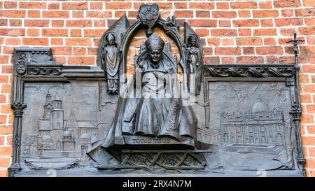 Memorial plaque to St. John Paul II in the center of Krakow, Poland on the main square. Stock Photo