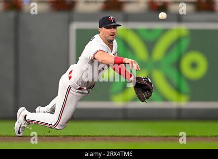 Minnesota Twins' Kyle Farmer (12) tosses his bat after striking