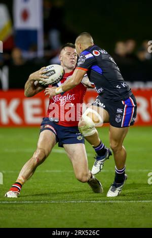 Shaun Kenny-Dowall of the Roosters is challenged by Tuimoala Lolohea of the Warriors in an NRL match between the New Zealand Warriors and Sydney Roosters at Mount Smart Stadium in Auckland, New Zealand Stock Photo