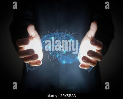 AI brain. Low poly wireframe mesh of artificial intelligence. Polygonal line art in a man's hands. Humans use AI Stock Photo