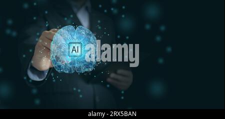 AI brain. A businessman's hand with a stylus tapping on a low poly wireframe mesh of artificial intelligence. Human uses AI Stock Photo