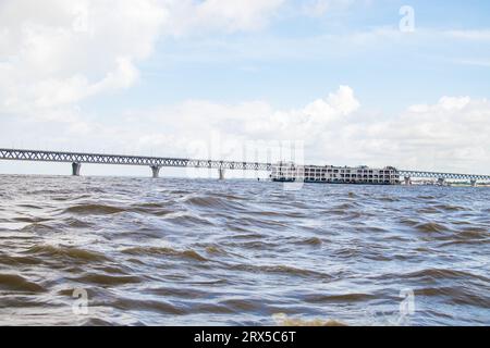 Padma Bridge exclusive 4k image under the beautiful cloudy sky from Padma River, Bangladesh Stock Photo