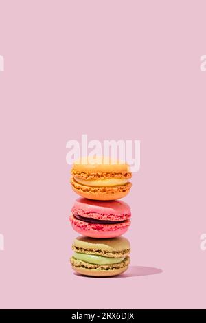Multi colored macaroons stacked in studio Stock Photo
