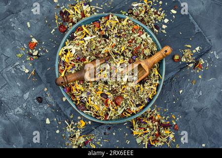 Herbal tea with healthy herbs tea in wooden spoons Stock Photo