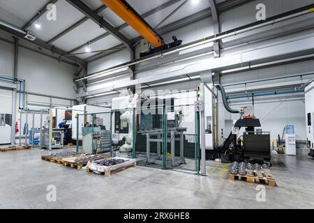 Technician working on machines in industry Stock Photo