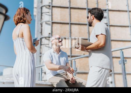 Successful Partners Collaborating on Urban Construction Project Stock Photo