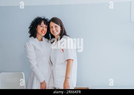 A shot of two gorgeous female doctors posing for the camera. Copy space. Stock Photo