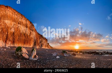 Chalk cliffs near coast at sunset Stock Photo
