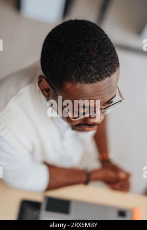 Businessman discussing with his partners, colleagues, and leaders. Work together in a corporate office, discussing ideas and maximizing profits. Stock Photo