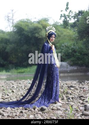 typical Central Javanese bride's dress Stock Photo