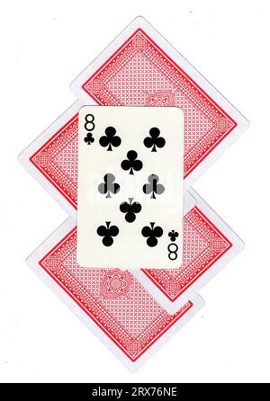 A montage of vintage playing card backs with the eight of clubs revealed. Stock Photo