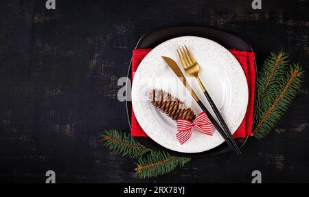 Christmas table setting for celebration design. Holiday celebration.  Kitchen dining table. Winter holiday season. Food decor. Top view, flat lay Stock Photo