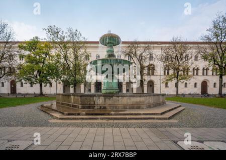 Fountain at Geschwister-Scholl-Platz (Scholl Siblings Square) - Munich, Bavaria, Germany Stock Photo