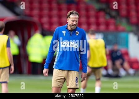 Harry Pell of AFC Wimbledon warms up before the Sky Bet League 2 match between Walsall and AFC Wimbledon at the Banks's Stadium, Walsall on Saturday 23rd September 2023. (Photo: Gustavo Pantano | MI News) Credit: MI News & Sport /Alamy Live News Stock Photo