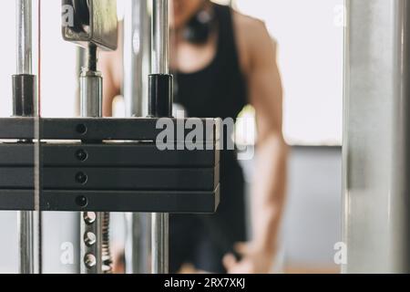 Iron Bar Heavy Weight Loading Level in Muscle Training Machine in Fitness Sport Club Stock Photo