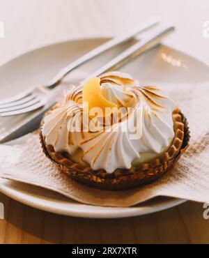 Lemon pie tartlet in a luxury Mediterranean cafe Stock Photo