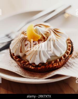Lemon pie tartlet in a luxury Mediterranean cafe Stock Photo