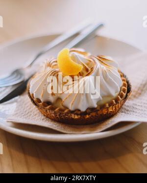 Lemon pie tartlet in a luxury Mediterranean cafe Stock Photo