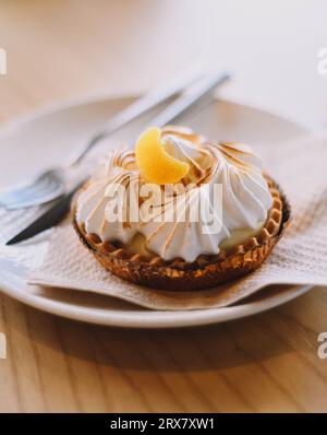 Lemon pie tartlet in a luxury Mediterranean cafe Stock Photo