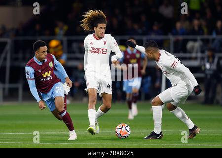 Manchester United's Hannibal Mejbri (centre) battle for the ball with Burnley's Luke McNally (left) during the Premier League match at Turf Moor, Burnley. Picture date: Saturday September 23, 2023. Stock Photo