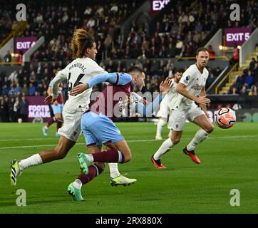 Turf Moor, Burnley, Lancashire, UK. 23rd Sep, 2023. Premier League Football, Burnley versus Manchester United; Josh Brownhill of Burnley looks to beat Hannibal Mejbri of Manchester United to get a cross into the box Credit: Action Plus Sports/Alamy Live News Stock Photo