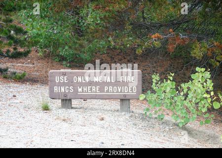 Campers warning sign in the Sierra Nevada mountains  California. Telling them that fires are only allowed in the metal fire rings provided in campsite Stock Photo