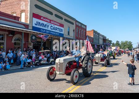 Plains, United States. 23rd Sep, 2023. Antique farm tractors process down Main Street during the 26th annual Plains Peanut Festival in honor of former President Jimmy Carter, September 23, 2023 in Plains, Georgia. Former President Jimmy Carter and his wife Rosalynn Carter, life-long residents of the village were briefly spotted at the festival inside a private vehicle. Credit: Richard Ellis/Richard Ellis/Alamy Live News Stock Photo