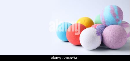 Many different bath bombs on white background. Space for text Stock Photo