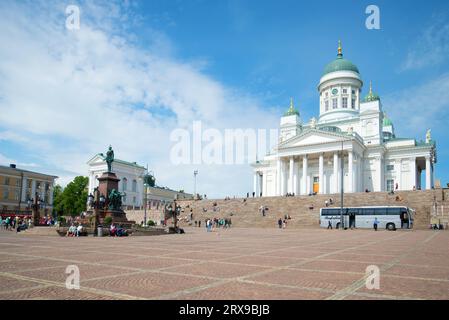 HELSINKI, FINLAND - JUNE 11, 2017: Monument to the Russian Emperor Alexander II and the Cathedral of St. Nicholas on the Senate Square Stock Photo