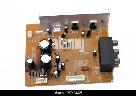 Cairo, Egypt, September 19 2023:  Electronic board of a car subwoofer amplifier sound control panel unit, A subwoofer (or sub) is a loudspeaker design Stock Photo