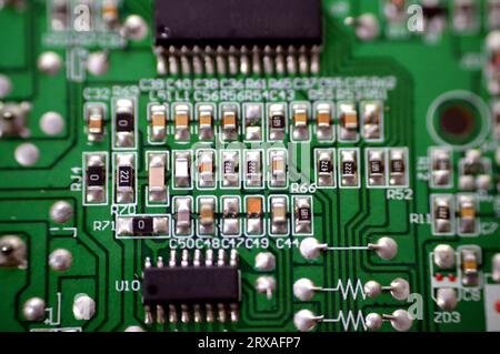 Cairo, Egypt, September 19 2023:  Electronic board of a car subwoofer amplifier sound control panel unit, A subwoofer (or sub) is a loudspeaker design Stock Photo