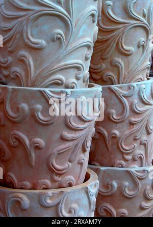 Clay pots, stacked on top of each other, decorated with ornaments, flower pot, flower pots, planters Stock Photo